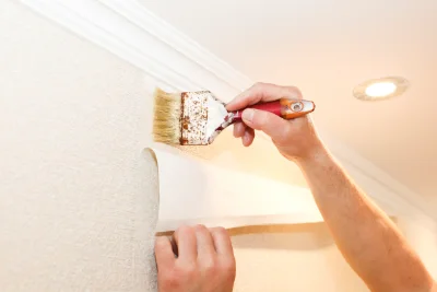 Pose de papier peint à Beure — revêtements muraux et toiles de verre